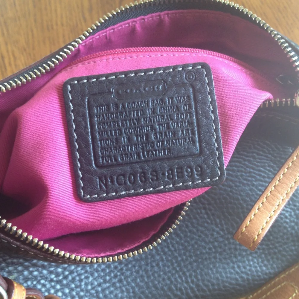 Coach sleek black